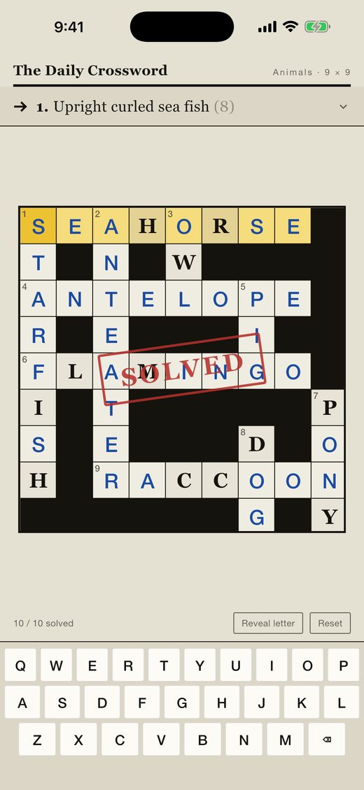 A completed English crossword with a red SOLVED stamp across the grid.